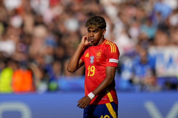 Spain's Lamine Yamal follows the action during a Group B match between Spain and Croatia at the Euro 2024 soccer tournament in Berlin, Germany, Saturday, June 15, 2024. (AP Photo/Manu Fernandez)