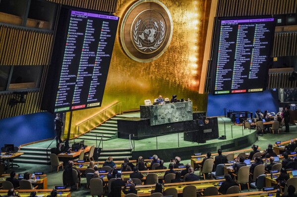 Display monitors show the result of voting in the United Nations General Assembly, in favor of a resolution calling on Israel to uphold legal and humanitarian obligations in its war with Hamas, Tuesday, Dec. 12, 2023 at U.N. headquarters. (AP Photo/Bebeto Matthews)