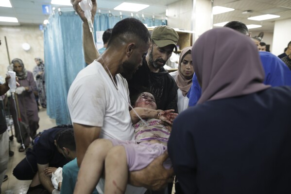 Palestinians wounded in the Israeli bombardment of the Gaza Strip arrive at al-Aqsa Hospital in Deir al Balah on Saturday, June 8, 2024. (AP Photo/Jehad Alshrafi)