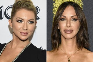 In this combination photo, Stassi Schroeder attends the Glamour Women of the Year Awards in New York on Nov. 11, 2019, left, and Kristen Doute arrives at the Los Angeles premiere of "Pitch Perfect 3" on Dec. 12, 2017. Schroeder and Doute are among four cast members of the Bravo TV series "Vanderpump Rules" who will not be returning for another season of the series. It was revealed last week that Schroeder and Doute had reported a former African American coworker, Faith Stowers, for a crime she had nothing to do with. Stowers appeared on two seasons of “Vanderpump.” (AP Photo)
