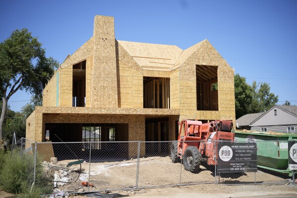 FILE - A new home under construction is seen, Aug. 21, 2023, in southeast Denver. On Thursday, April 11, 2024, Freddie Mac reports on this week's average U.S. mortgage rates. (AP Photo/David Zalubowski, File)