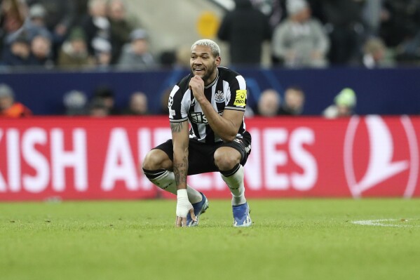 Newcastle's Joelinton reacts after AC Milan's Samuel Chukwueze scored his side's 2nd goal during the Champions League group F soccer match between Newcastle United and AC Milan at St. James' Park, in Newcastle, England, Wednesday, Dec. 13, 2023. (AP Photo/Scott Heppell)