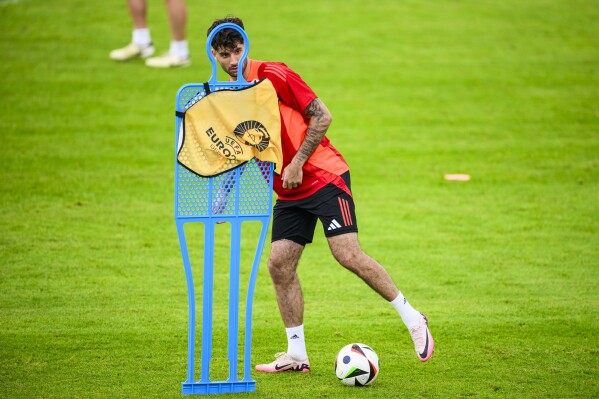 Hungary's Dominik Szoboszlai in action during training session of Hungary's national soccer team in Weiler-Simmerberg, Germany, Wednesday, June 12, 2024. (Tom Weller/dpa via AP)