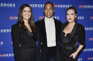 FILE - CNN anchors Kaitlan Collins, from left, Don Lemon and Poppy Harlow appear at the 16th annual CNN Heroes All-Star Tribute on Dec. 11, 2022, in New York. (Photo by Evan Agostini/Invision/AP, File)