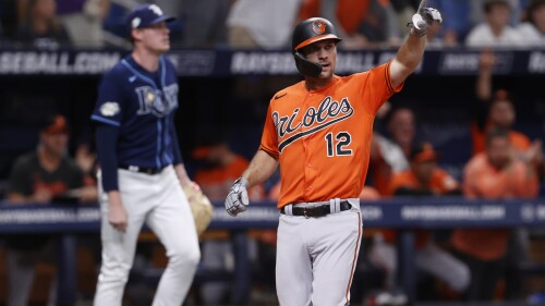 Baltimore Orioles' Adam Frazier reacts after scoring against the Tampa Bay Rays during the ninth inning of a baseball game Saturday, July 22, 2023, in St. Petersburg, Fla. (AP Photo/Scott Audette)