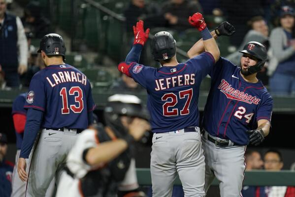 Minnesota Twins catcher Ryan Jeffers (27) is greeted by shortstop