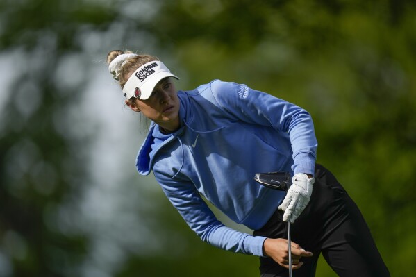 Nelly Korda looks after her shot off the 13th tee during the first round of the LPGA Cognizant Founders Cup golf tournament, Thursday, May 9, 2024, in Clifton, N.J. (AP Photo/Seth Wenig)