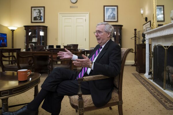 
              Senate Majority Leader Mitch McConnell, R-Ky., discusses the GOP agenda for next year during an interview in his Capitol Hill office with The Associated Press, in Washington, Thursday, Dec. 21, 2017. McConnell is skeptical at best about revisiting the Senate's botched efforts to dismantle Barack Obama's Affordable Care Act despite one GOP lawmaker's insistence the health care law will be scrapped. (AP Photo/J. Scott Applewhite)
            