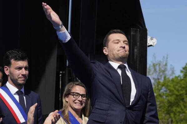 Le Pen supporters rally in Paris, turning a protest right into a populist display of drive
