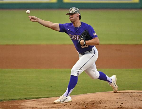 LSU starting pitcher Paul Skenes (20) pitches against Mississippi State during an NCAA college baseball game, Friday, May 12, 2023, at Alex Box Stadium on the campus of LSU in Baton Rouge, La. The LSU Tigers enter the NCAA baseball tournament with the top two prospects in this summer's major baseball draft spearheading their postseason push. Centerfielder Dylan Crews is hitting .420 and was named the SEC player of the year. He's the consensus top prospect in this July's amateur draft. Next is 6-foot-6, 247-pound pitcher and Air Force transfer Paul Skenes. The righty throws 100 miles per hour, leads the nation with 167 strikeouts and was named SEC pitcher of the year. (Hilary Scheunuk/The Times-Picayune/The New Orleans Advocate via AP)