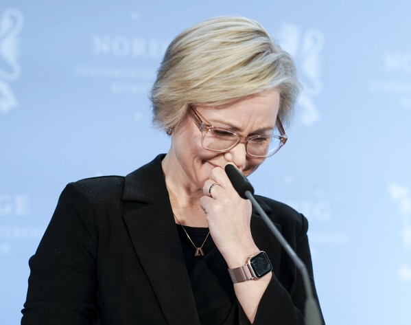 Norwegian Minister of Health and Care Ingvild Kjerkol sobs during a press conference at the Prime Minister's office SMK in Oslo, Norway, Friday April 12, 2024. Norway’s health minister resigned Friday, the second Norwegian government member to step down this year amid allegations they plagiarized academic works. (Cornelius Poppe/NTB Scanpix via AP)