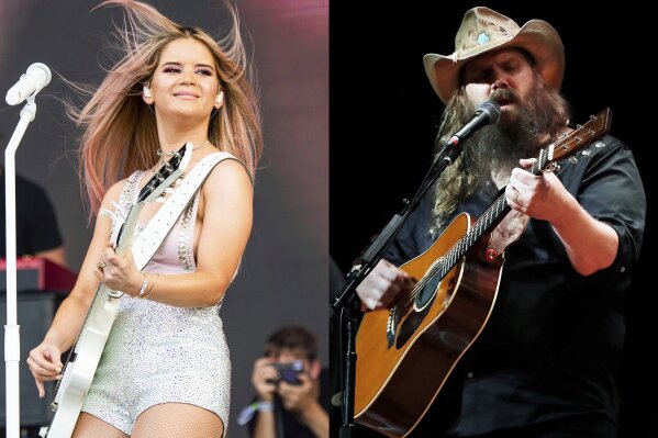 Maren Morris performs at the Bonnaroo Music and Arts Festival in Manchester, Tenn., on  June 15, 2019 , left, and Chris Stapleton performs during Marty Stuart's Late night Jam at the Ryman Auditorium in Nashville, Tenn. on June 7, 2018. Morris and Stapleton lead the nominations for this year's Academy of Country Music Awards. The academy announced on Friday that Morris and Stapleton both had six nominations ahead of the April 18 awards show, which will air on CBS from Nashville, Tennessee. (AP Photo)