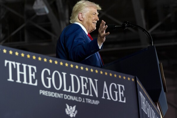President Donald Trump speaks on his first 100 days at Macomb County Community College Sports Expo Center, Tuesday, April 29, 2025, in Warren, Mich. (AP Photo/Alex Brandon)