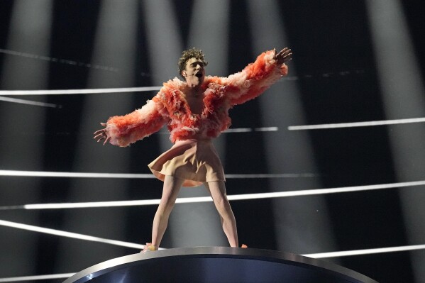Nemo of Switzerland performs the song The Code during the Grand Final of the Eurovision Song Contest in Malmo, Sweden, Saturday, May 11, 2024. (AP Photo/Martin Meissner)
