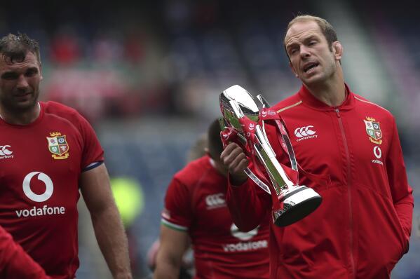 British and Irish Lions' captain Alun Wyn Jones holds the trophy at the end the friendly rugby match between British and Irish Lions and Japan at the Murrayfield stadium in Edinburgh, Scotland, Saturday, June 26, 2021. (AP Photo/Scott Heppell)