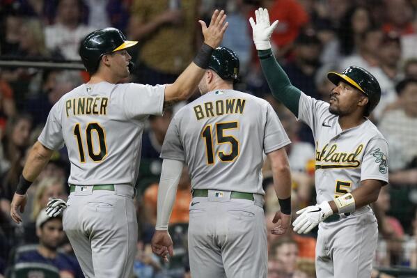 Pinder slam lifts A's, trade target Montas over Astros 5-3