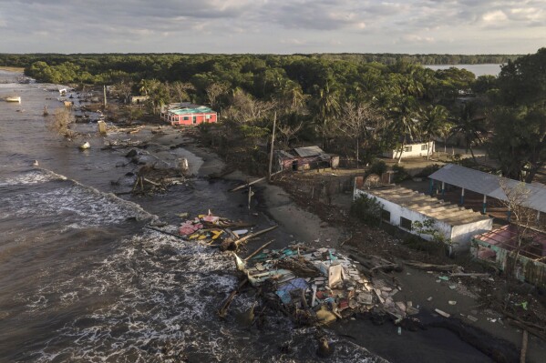 An aerial view of the coastal community of El Bosque, in the state of Tabasco, Mexico, Thursday, Nov. 30, 2023, destroyed by flooding driven by a sea-level rise and increasingly brutal winter storms. (AP Photo/Felix Marquez)