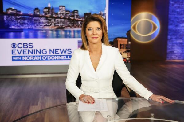 This image released by CBS shows Norah O'Donnell, host of the new "CBS Evening News with Norah O'Donnell." Between election deniers and threats to voting rights, news organizations have emphasized the beat. That will continue next Tuesday, with coverage plans for the midterm elections rounding into shape. CBS News will have its first-ever “Democracy Desk” to look at those issues and how law enforcement is dealing with threats.  (Michele Crowe/CBS via AP)