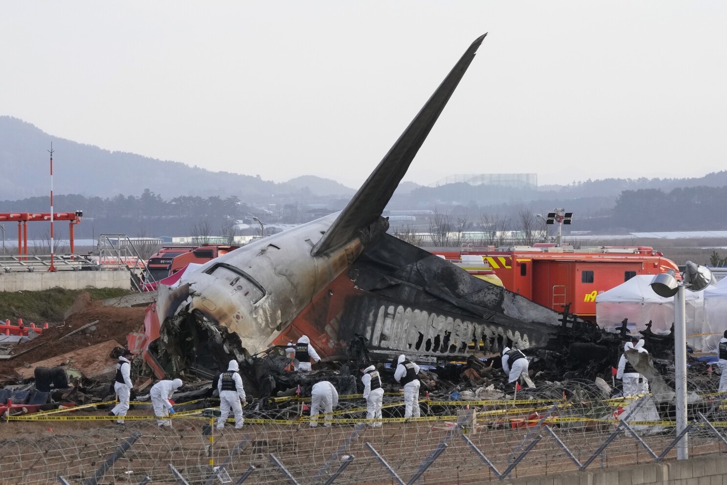 Japan grounds military training aircraft after crash leaves 2 crew members  missing | AP News
