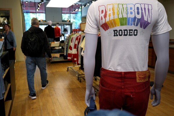 2024 Levi's Pride collection tee is displayed at Levi's Store in downtown Chicago, Monday, June 10, 2024. Many big retailers, including Levi's, Target, Old Navy and Urban Outfitters, have put out Pride collections for years. (AP Photo/Nam Y. Huh)
