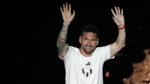 Inter Miami's Lionel Messi waves to fans as he is introduced during a celebration by the team at DRV PNK Stadium, Sunday, July 16, 2023, in Fort Lauderdale, Fla. (AP Photo/Rebecca Blackwell)