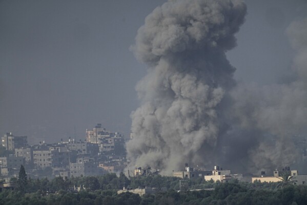 Smoke rises following an Israeli airstrike in the Gaza Strip, as seen from southern Israel, Wednesday, Nov. 1, 2023. (AP Photo/Ariel Schalit)