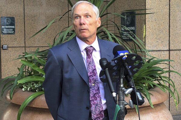 
              Rich Pfeiffer, attorney for Leslie Van Houten, speaks to reporters after a hearing before California's 2nd District Court of Appeal, which is considering whether to overturn a judge's ruling denying her parole last year, in downtown Los Angeles Wednesday, April 24, 2019. The court is questioning whether it has the jurisdiction to decide whether Charles Manson follower Leslie Van Houten should be freed from prison, or whether the issue becomes moot after Gov. Gavin Newsom weighs in.  (AP Photo/Amanda Lee Myers)
            