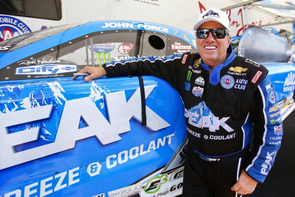 FILE - Funny Car driver John Force looks to get back on track for the last day of qualifying at the NHRA Kansas Nationals at Heartland Park, May 21, 2016, in Topeka Kansas. (Chris Neal/The Topeka Capital-Journal via ĢӰԺ, File)
