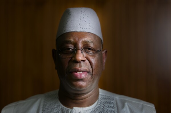 Senegal President Macky Sall poses during an interview with The Associated Press at the presidential palace in Dakar, Senegal, Friday, Feb. 9, 2024. (AP Photo/Sylvain Cherkaoui)