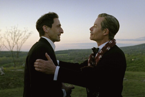 Adrien Brody, left, and Guy Pearce in a scene from "The Brutalist." (Lol Crawley/A24 via AP)