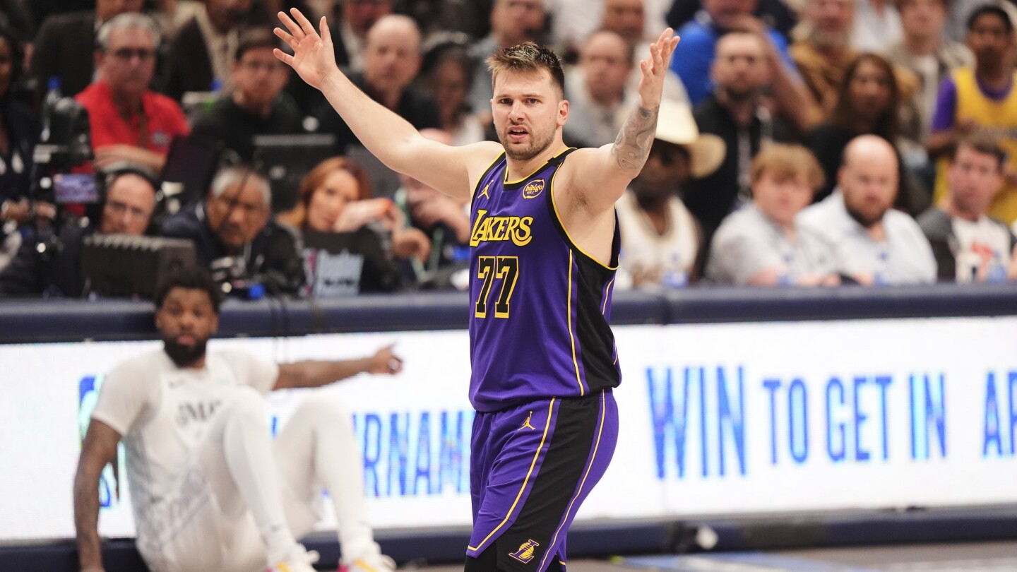 Luka Doncic scores 45 points in Dallas return as Lakers clinch playoff spot with 112-97 win