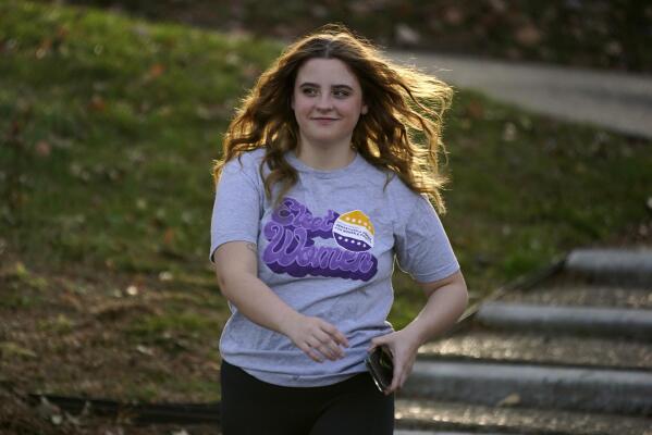 Brianna McCullough, 20, a sophomore at Chatham University in Pittsburgh, walks through campus on Thursday, Nov. 10, 2022. Support for abortion rights did drive women to the polls in Tuesday's elections. But for many, the issue took on higher meaning, part of an overarching concern about the future of democracy. "If they can take this away, they can take anything away from people. And I don't think that's right." McCullough said.(AP Photo/Gene J. Puskar)