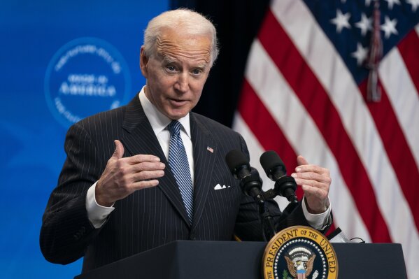 FILE - In this Jan. 25, 2021, file photo, President Joe Biden answers questions from reporters in the South Court Auditorium on the White House complex, in Washington. Biden is set to announce a wide-ranging moratorium on new oil and gas leasing on U.S. lands, as his administration moves quickly to reverse Trump administration policies on energy and the environment and address climate change.  (AP Photo/Evan Vucci, File)