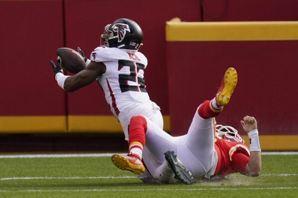 Atlanta Falcons safety Keanu Neal intercepts a pass intended for Kansas City Chiefs quarterback Patrick Mahomes during the first half an NFL football game, Sunday, Dec. 27, 2020, in Kansas City. (AP Photo/Charlie Riedel)