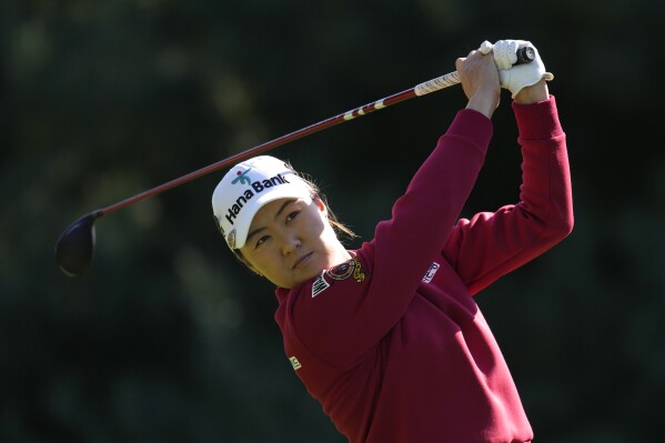 Minjee Lee of Australia watches her tee shot during the second round of the BMW Ladies Championship at the Seowon Hills Country Club in Paju, South Korea, Friday, Oct. 20, 2023. (AP Photo/Lee Jin-man)