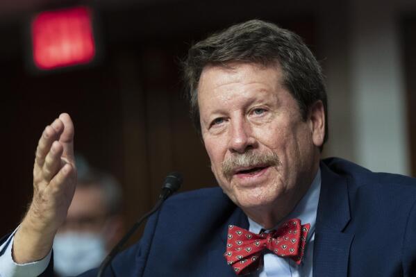 FILE - Robert Califf testifies before a Senate Committee on Health, Education, Labor and Pension hearing on the nomination to be commissioner of Food and Drug Administration on Capitol Hill in Washington, on Dec. 14, 2021. Vacant high-ranking positions across the executive branch could be taking a toll on the Biden administration. At risk are President Joe Biden's plans to improve the economy, fight the pandemic and implement the $1 trillion infrastructure law. (AP Photo/Manuel Balce Ceneta, File)