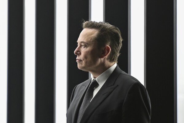 Tesla CEO Elon Musk attends the opening of the Tesla factory Berlin Brandenburg in Gruenheide, Germany, March 22, 2022. (Patrick Pleul/Pool via AP, File)