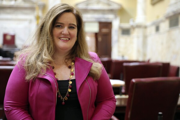 Maryland state Sen. Ariana Kelly, a Democrat, poses in the Maryland Senate, Wednesday, March 6, 2024, in Annapolis, Md., shortly before testifying on legislation she is sponsoring to create a grant program to provide funding to boost security at abortion clinics. (AP Photo/Brian Witte)