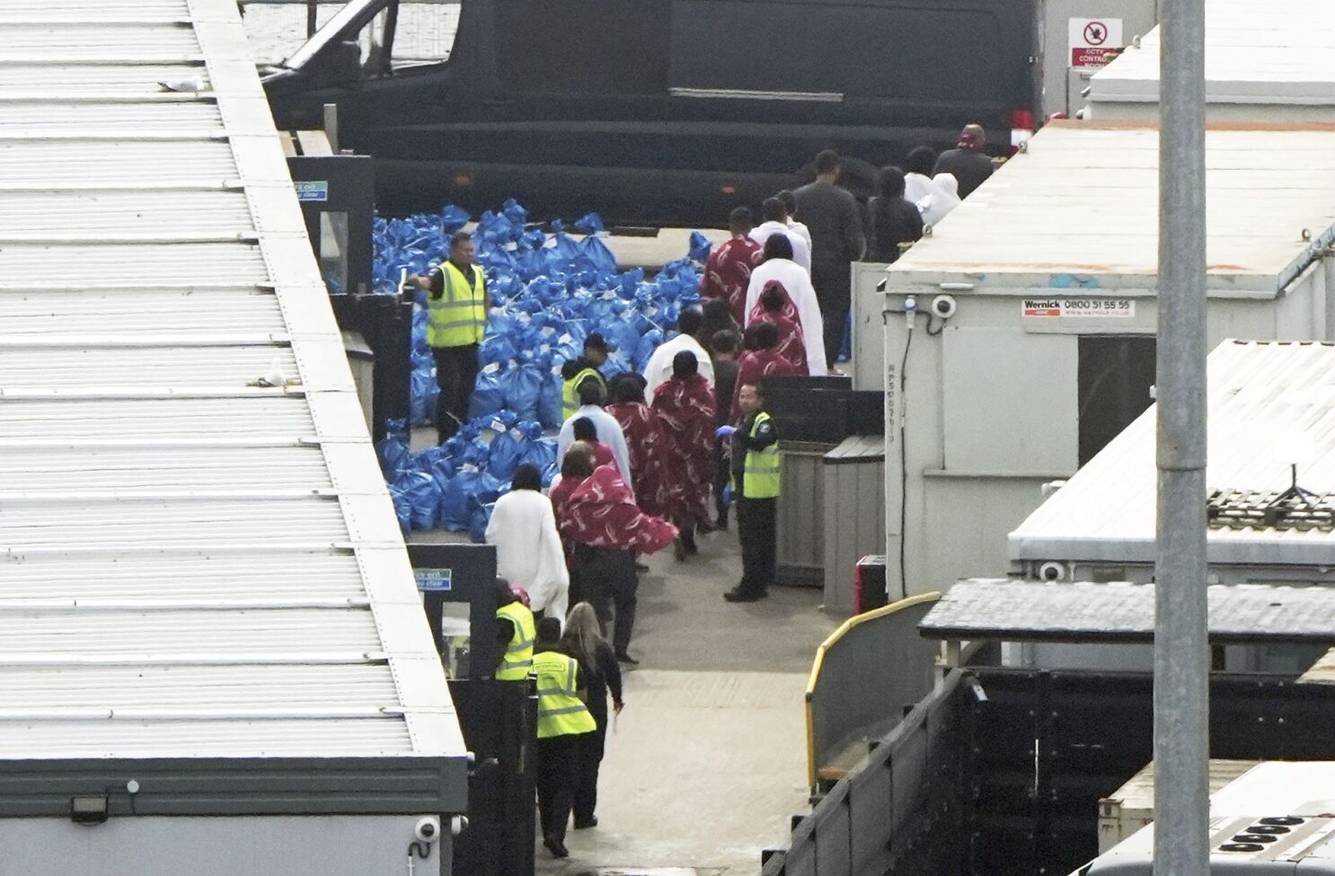 Nearly 1,200 migrants reach the UK in boats across the Channel in a one-day high for the year