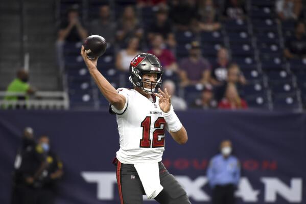 Tampa Bay Buccaneers quarterback Tom Brady throws a pass against the Houston Texans during the first half of an NFL preseason football game Saturday, Aug. 28, 2021, in Houston. (AP Photo/Eric Christian Smith)