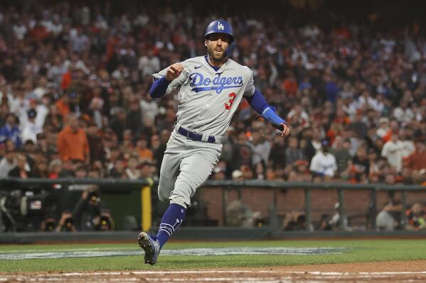 Urías hits, pitches Dodgers past Giants to even NLDS series