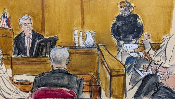 Michael Cohen, left, testifies on the witness stand in Manhattan Criminal Court on Monday, May 13, 2024 in New York.  (Elizabeth Williams, via AP)