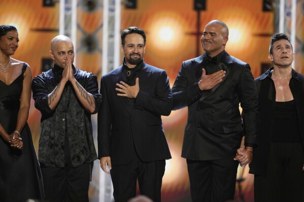 Renee Elise Goldsberry, from left, Lin-Manuel Miranda, and Christopher Jackson perform a medley from "Hamilton" during the 78th Tony Awards on Sunday, June 8, 2025, at Radio City Music Hall in New York. (Photo by Charles Sykes/Invision/AP)