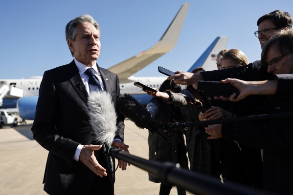 U.S. Secretary of State Antony Blinken talks to reporters prior boarding his aircraft to depart Washington on travel to the Middle East and Asia at Andrews Air Force Base. Md., Thursday, Nov. 2, 2023. (Jonathan Ernst/Pool via AP)