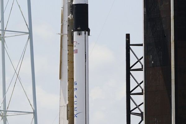 A SpaceX Falcon 9 rocket stands ready for launch on pad 39A at the Kennedy Space Center in Cape Canaveral, Fla., Thursday, Aug. 24, 2023. The launch is scheduled for early Friday morning. (AP Photo/John Raoux)