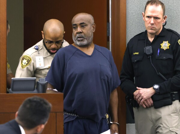 FILE - Duane "Keffe D" Davis is led into the courtroom at the Regional Justice Center on Wednesday, Oct. 4, 2023, in Las Vegas. Davis has been charged in the 1996 fatal drive-by shooting of rapper Tupac Shakur. Davis, 60, was arrested Sept. 29, 2023, and charged with orchestrating the drive-by shooting of Shakur near the Las Vegas Strip that also wounded rap music mogul Marion “Suge” Knight. (Bizuayehu Tesfaye/Las Vegas Review-Journal, Pool)