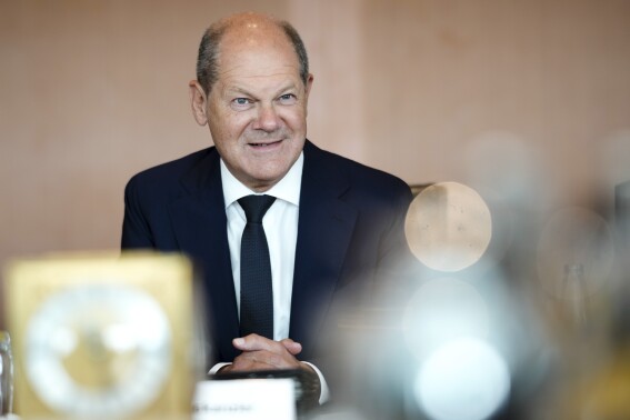 FILE - German Chancellor Olaf Scholz attends the cabinet meeting of the German government at the chancellery in Berlin, Germany, Wednesday, Aug. 23, 2023. Scholz is vowing that his coalition government will quickly resolve a dispute over child benefits that has marred attempts to put months of damaging public infighting behind it. (AP Photo/Markus Schreiber, file)