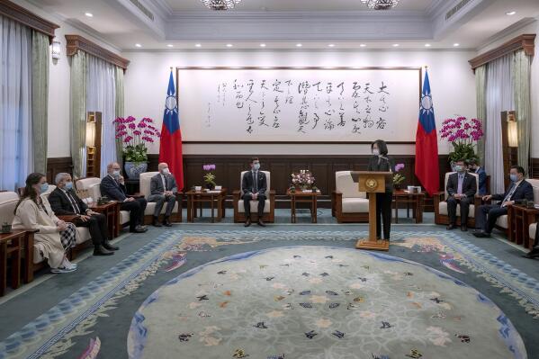 In this photo released by the Taiwan Presidential Office, Taiwan's President Tsai Ing-wen, center right, speaks during a meeting with Swiss lawmakers in Taipei, Taiwan, Monday, Feb. 6, 2023. A group of Swiss lawmakers met with Taiwan's president and said Monday their government wants to deepen political relations, adding to shows of support by foreign politicians for the self-ruled island democracy in the face of Chinese intimidation. (Taiwan Presidential Office via AP)