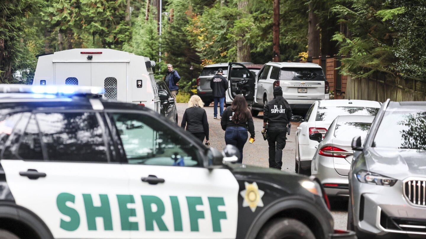 Five people were killed in a shooting at a home in Washington state while a teenager was in custody, police said