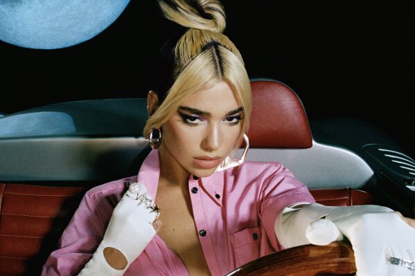 This cover image released by Warner Records shows Dua Lipa's "Future Nostalgia". Dua Lipa has moved up the date to her anticipated sophomore project. Originally due to be released April 3, “Future Nostalgia” is now coming out Friday. (Warner Records via AP)